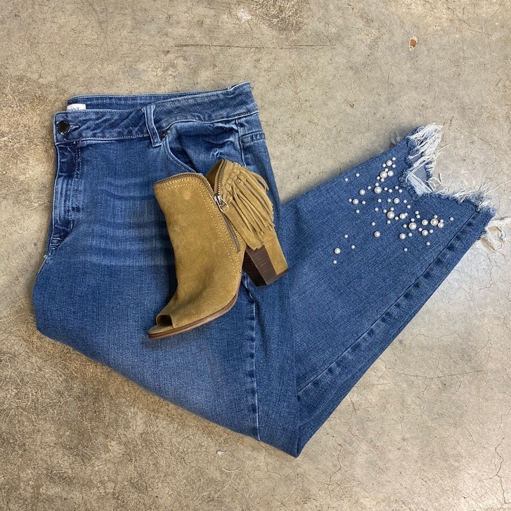 Lane Bryant denim with pearl ankle detail designed in New York there a mid rise